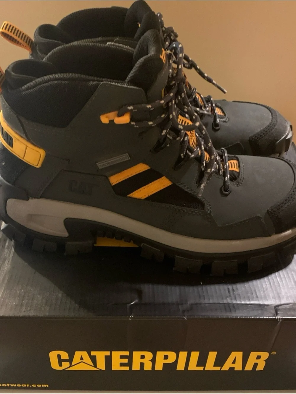 Caterpillar Black and Yellow Men’s Rugged Work Boots